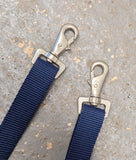 2 Sets - Leg straps (adjustable webbing).